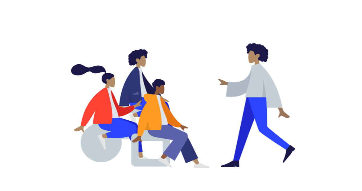 Image of people with one talking to a group